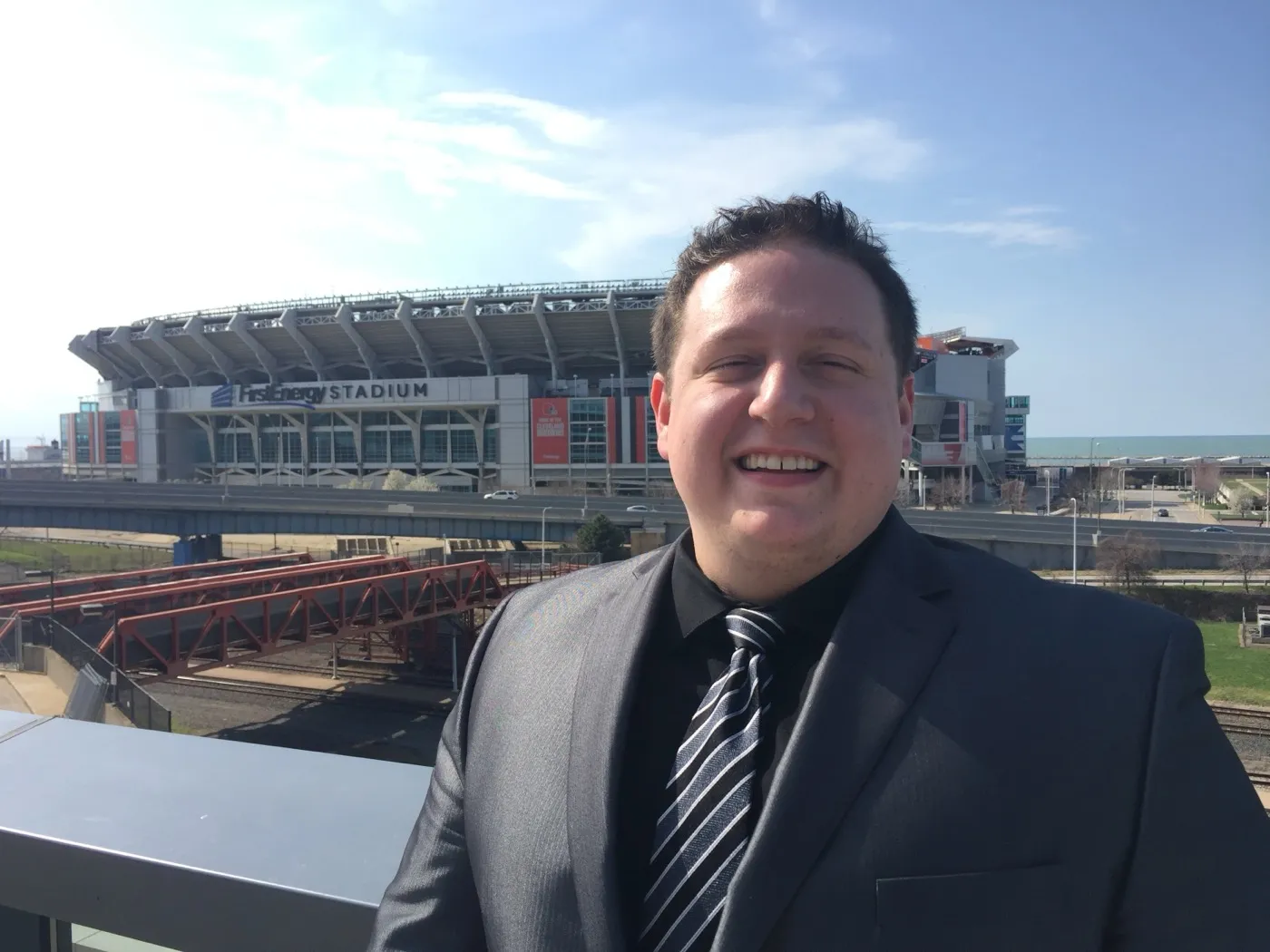 Mark Cicero in Cleveland, stadium behind him — photo from his blog
